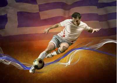 Ποδοσφαιριστής με την Ελληνική σημαία